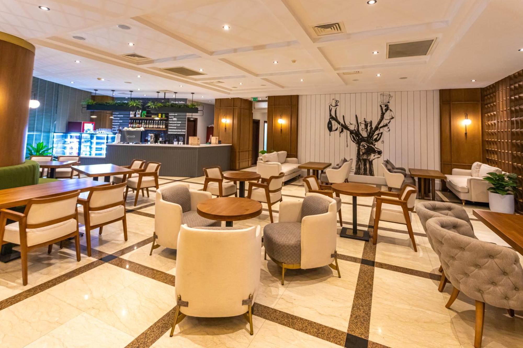 Grand Hotel Victory Aktav Dış mekan fotoğraf The lounge at the airport